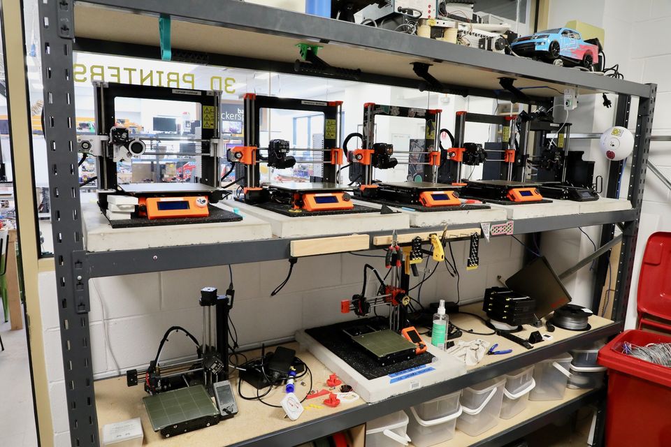 Shelves of Prusa 3D printers